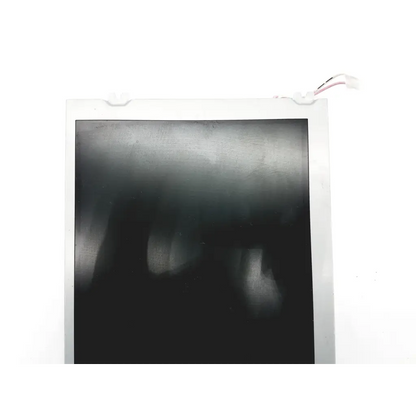 White-framed instant photo print with grayscale blurred hands on dark background displayed on sharp lq084v1dg41 lcd display