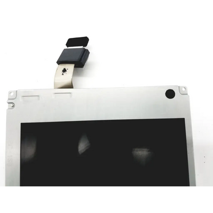 Silver-framed sharp lq084v1dg41 lcd display with black screen and flexible ribbon cable connector at the top