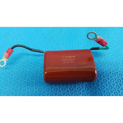 Red cylindrical shizuki high-voltage film capacitor with black and green wires for topcon retinal camera use