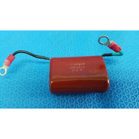 Red cylindrical shizuki high-voltage film capacitor with black and green wires for topcon retinal camera use