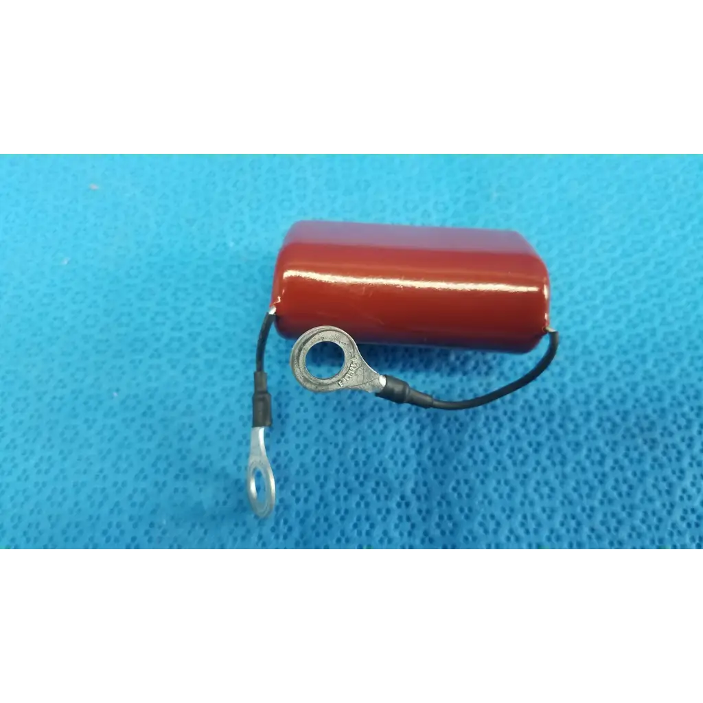 Red cylindrical shizuki mpp film capacitor 4.7k 630v with black wire and metal ring terminals for retinal camera use