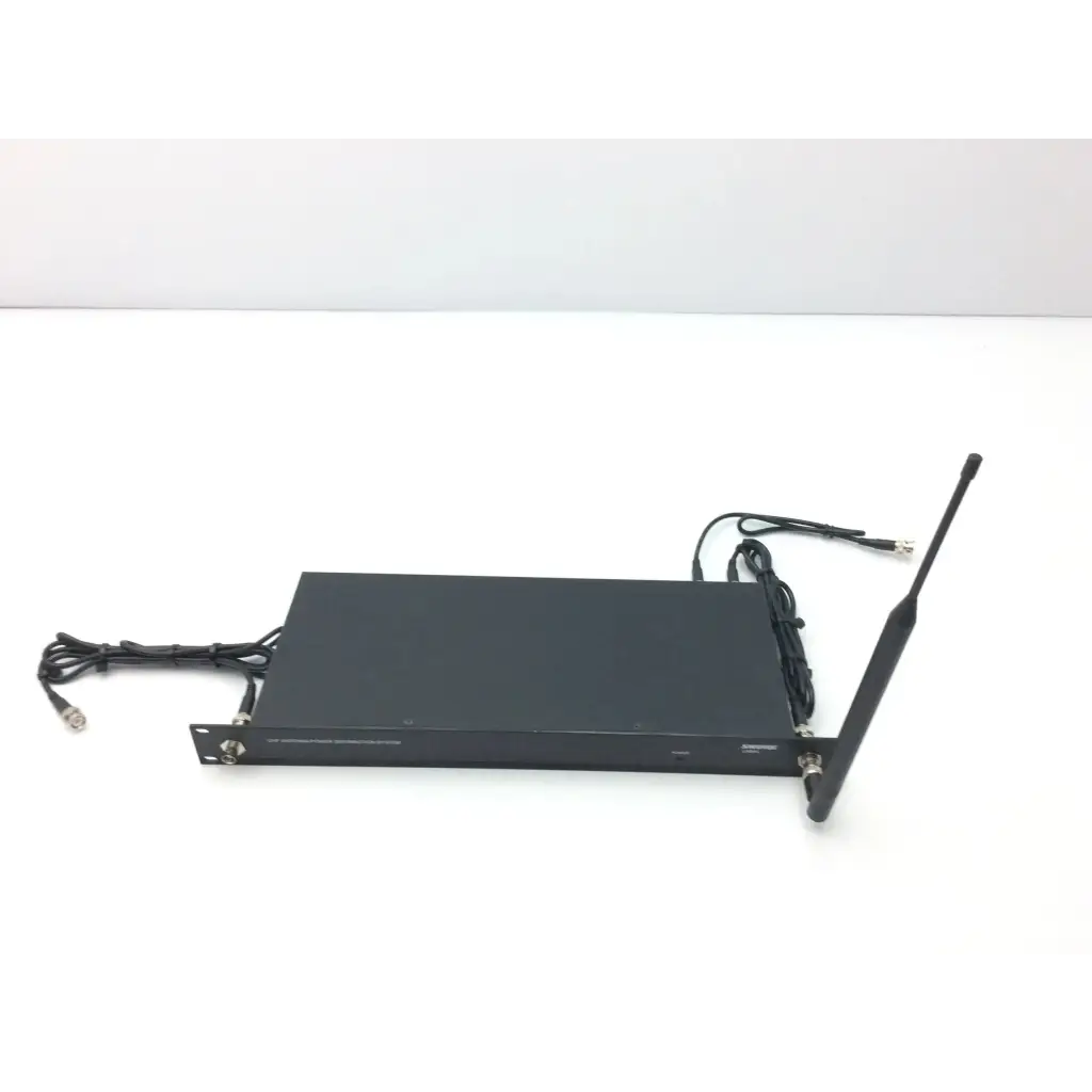Black rectangular shure ua844 uhf antenna and power distribution system with single antenna and multiple cables connected