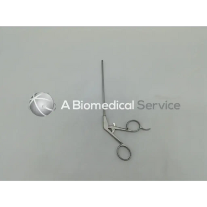 Silver surgical arthroscopic grasping forceps with long slender handle and circular finger loops by shutt linvatec surgical