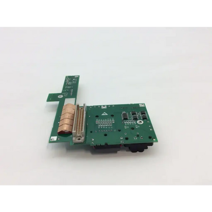 Green printed circuit board with copper traces and cylindrical inductor on siemens e539u a300 et302 io board