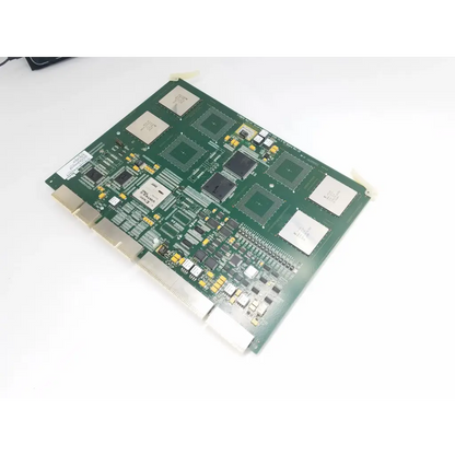 Green circuit board with multiple integrated circuits and connectors siemens medical solution x300 board rev 03