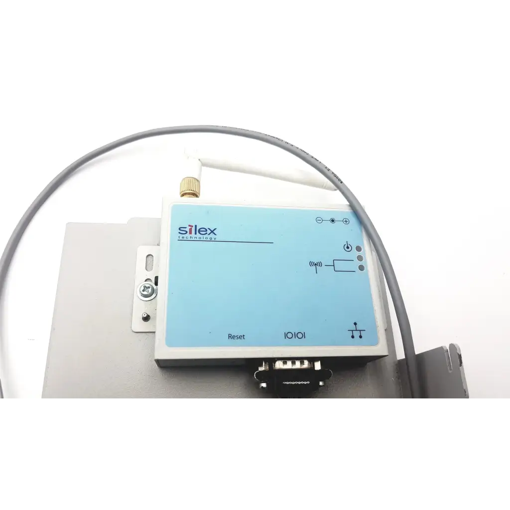 Light blue rectangular silex technology 75505r wireless serial server with white antenna and silver mounting bracket