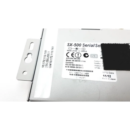 Silver silex technology sx-500 wireless serial server with white label showing model and regulatory info on the back side