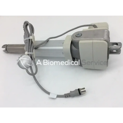 Gray electric hospital bed lift mechanism with metallic shaft and coiled cable for skf actuation hand control bbcb4-2
