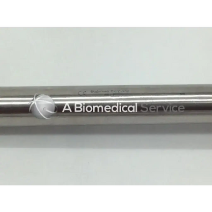 A sleek metallic sklar instrument meyerding hip and shoulder skid with polished stainless steel finish and engraved branding