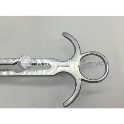 Silver stainless steel balfour retractor blade with distinctive handle design and engraved markings for surgical use