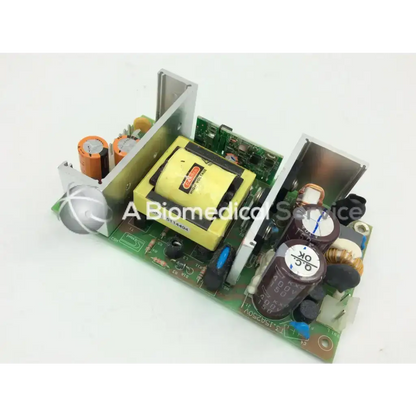 Green circuit board with yellow transformer and capacitors in skynet 850-9563-m power supplies unit