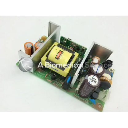 Green circuit board of skynet 850-9563-m power supplies featuring yellow transformer orange capacitors and silver heat sinks