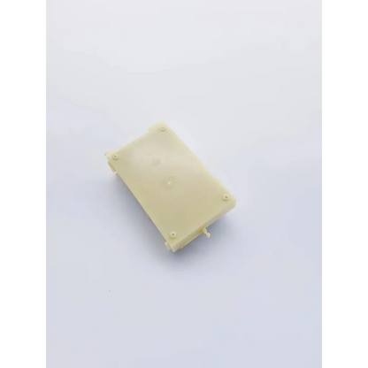 Off-white rectangular plastic housing with molded corners and side protrusions for snp-9549-m1 power supply