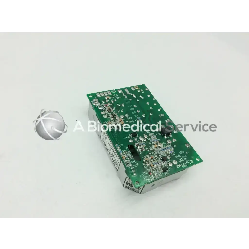 Green rectangular circuit board with silver components and black ICs in SL Power Electronics gsm28 28w power supply