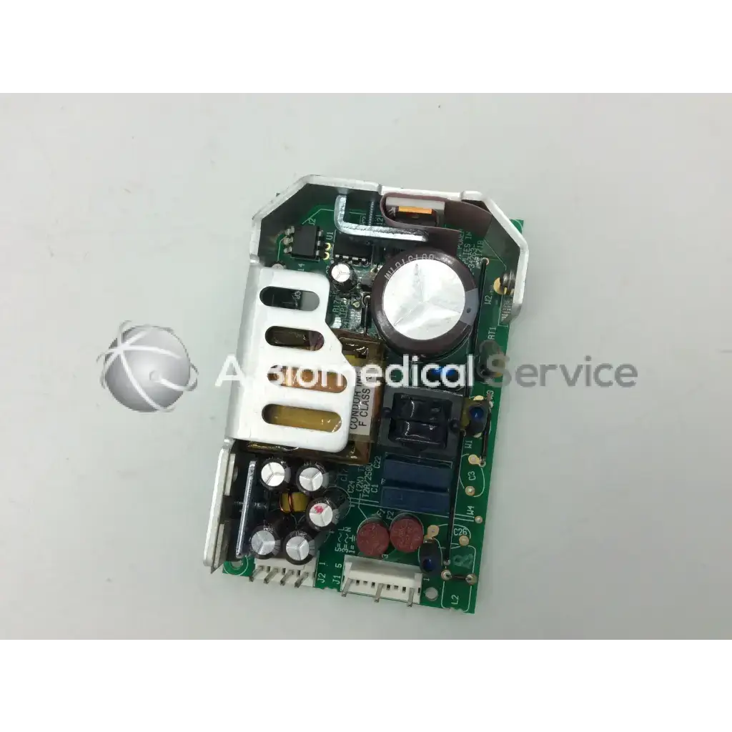 Green circuit board with silver and black components of sl power electronics gsm28 28w power supply unit