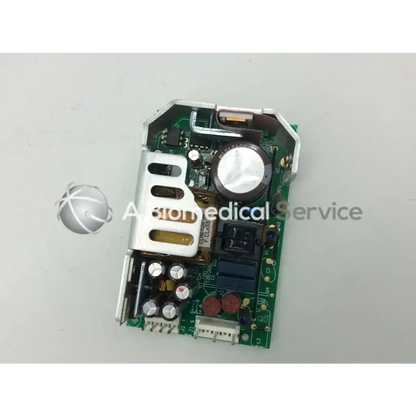 Green circuit board with silver and black components of sl power electronics gsm28 28w power supply unit