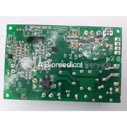 Green rectangular circuit board with electronic components and labels for sl power electronics gsm28 28w power supply