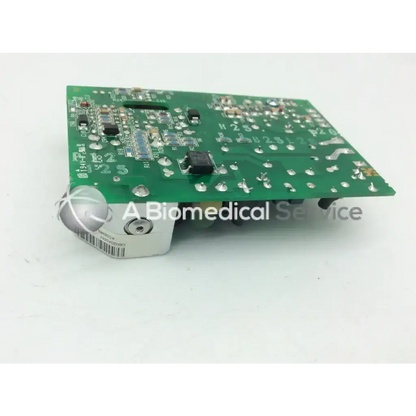 Green circuit board with silver metallic components and black integrated circuits in SL Power Electronics gsm28 28w power supply