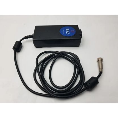Black Philips NDS power supply with coiled cable and metallic connector for medical power supply MW155RA2400F02
