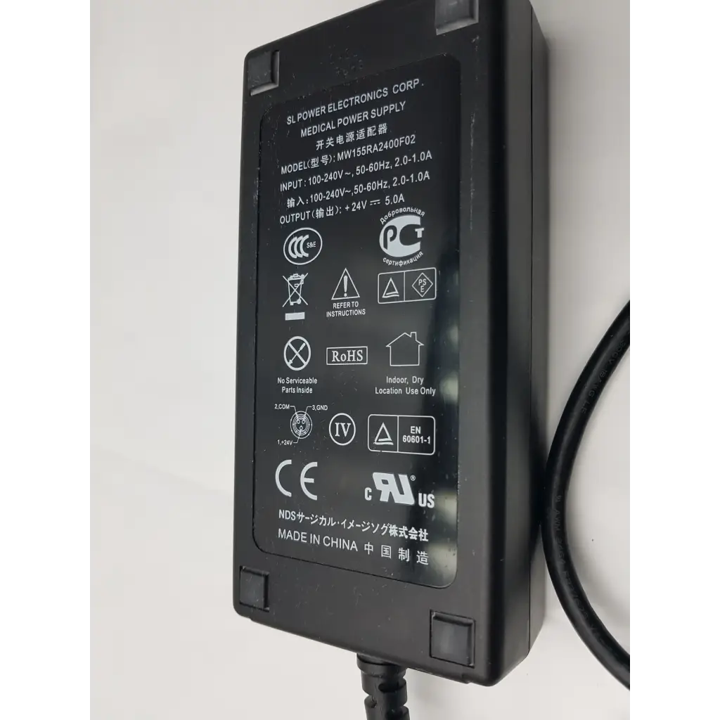 Black plastic medical power supply mw155ra2400f02 with matte finish and printed specifications on label back side