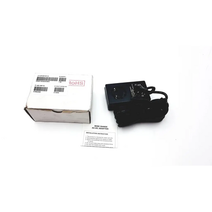 Black plastic wide range supply menb 1020a0500b02 medical power supply adapter with coiled power cord and labeled specifications
