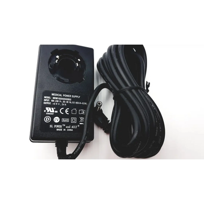 Black rectangular sl power medical power supply menb 1020a0500b02 with coiled cable and labeled specifications