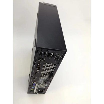 Black slim dell core i5 desktop computer tower with matte finish showing rear panel ports for windows 10 pro use