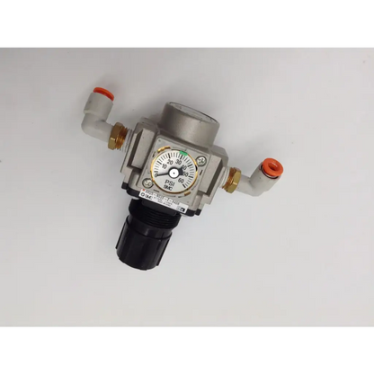 Silver metal air pressure regulator smc ar25-n02e-z-x406 7-50psi with orange caps and black adjustment knob