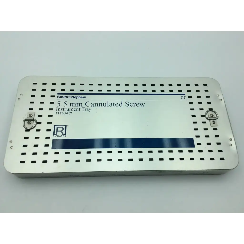 Silver metallic perforated instrument tray with printed labeling for smith and nephew 5.5 mm cannulated screw set