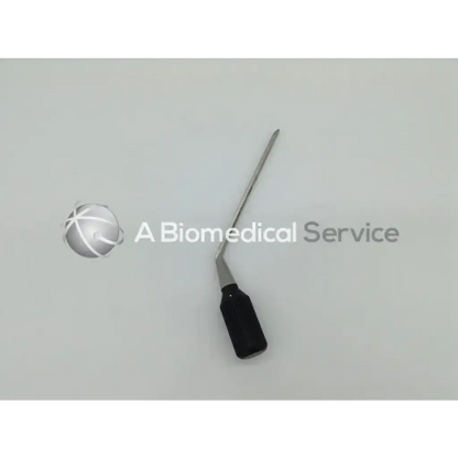 A sleek black-handled arthrogarde slotted hip surgical instrument with a long metallic shaft and angled tip for hip access
