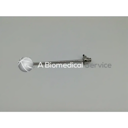 Silver arthrogarde hip access cannula with white spherical handle and metallic shaft for arthrogarde hip surgery
