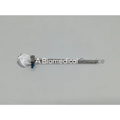 Silver arthrograde hip access cannula with spherical translucent head and metallic shaft for precise hip access