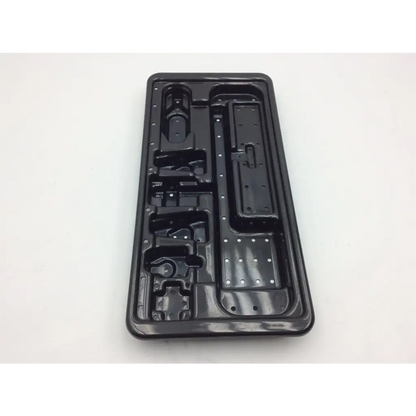 Black plastic tool tray with molded compartments for organizing tools in nephew acufex graftmaster case