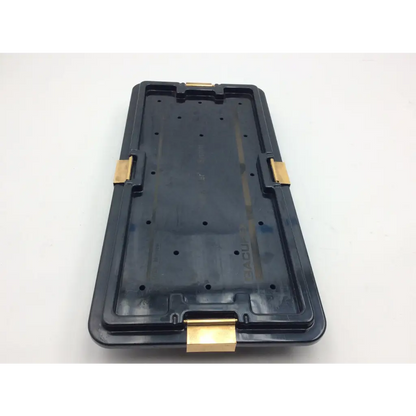 Black plastic smith & nephew acufex graftmaster case with gold metal latches for secure medical instrument storage