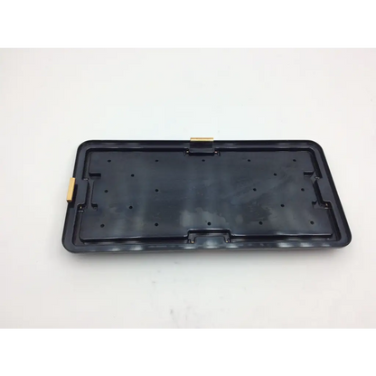 Black plastic keyboard tray with gold metal latches in nephew acufex graftmaster acufex graftmaster case