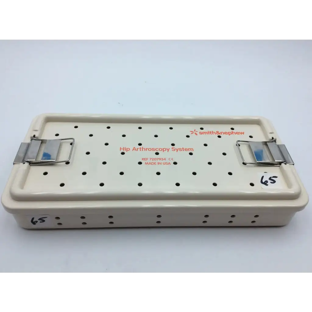 Beige smith & nephew case plastic hip arthroscopy system surgical tray with perforated lid and metal clamps aci-65 12731nj