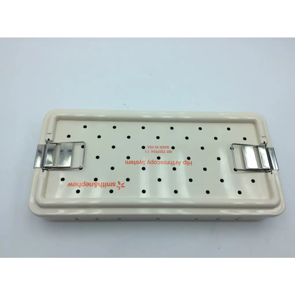 Cream-colored smith & nephew case plastic sterilization container for hip arthroscopy with metallic clamps aci-65 12731nj