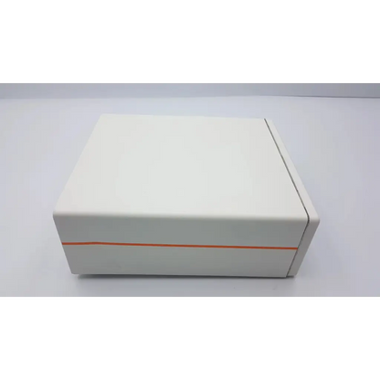 A sleek white rectangular nephew dyonics power ii control system box with a subtle orange accent stripe along its side