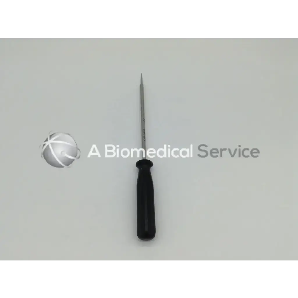 Black-handled smith & nephew om-9630 anchor extraction tool with slender metallic shaft and pointed tip for precise extraction