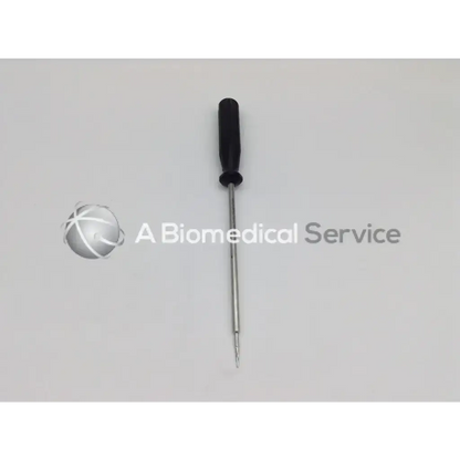Smith & Nephew OM-9630 anchor extraction tool with black handle metal shaft and pointed tip for precise anchor extraction