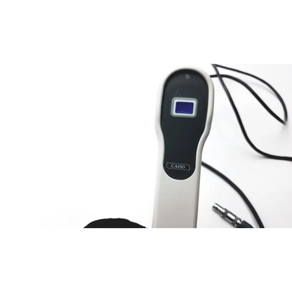 Black and white handheld cadd solis remote with small blue screen labeled cadd from smiths medical model 21-2186-25