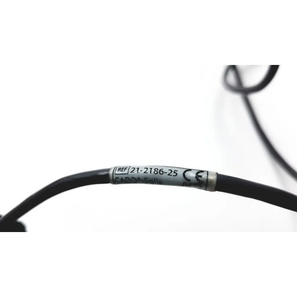 Black cable with silver label bearing reference number 21-2186-25 and ce marking for smiths medical cadd solis remote
