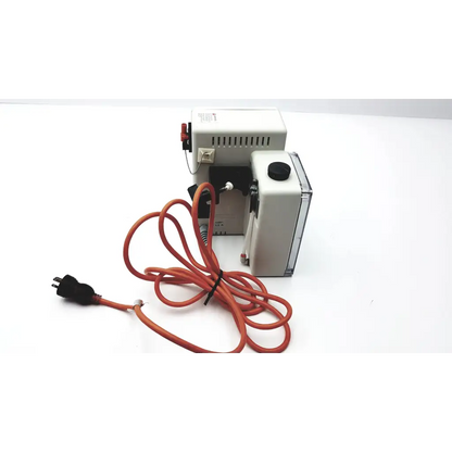 White smiths medical hotline fluid warmer hl-90 with orange power cord and black plug for medical fluid heating
