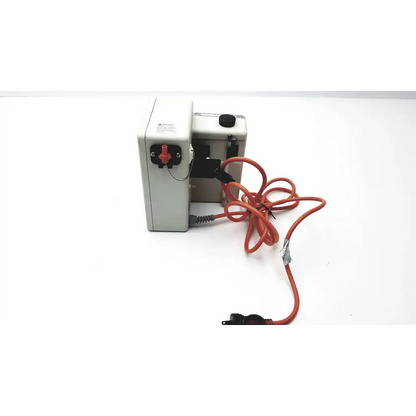 White industrial-grade smiths medical hotline fluid warmer hl-90 with red black knobs orange coiled power cord and gray connector end