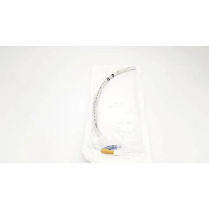 Clear plastic smiths medical portex tracheal tube 6.5mm with black measurement markings and yellow connector
