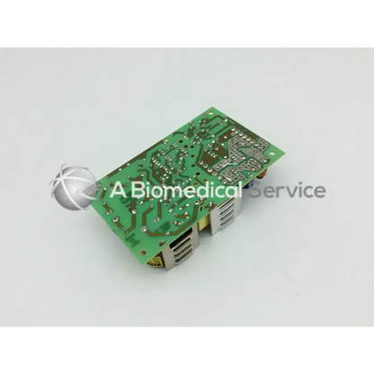 Green printed circuit board of snp-9563-m with silver soldered components and metallic heat sinks for input 100-250vac~2-1a 47-63hz