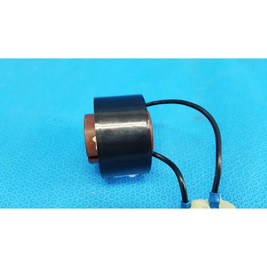 Black cylindrical solenoid actuator electromagnetic coil with copper terminals and two black wires for topcon retinal camera
