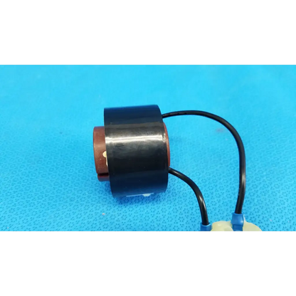 Black cylindrical solenoid actuator electromagnetic coil with copper terminals and two black wires for topcon retinal camera