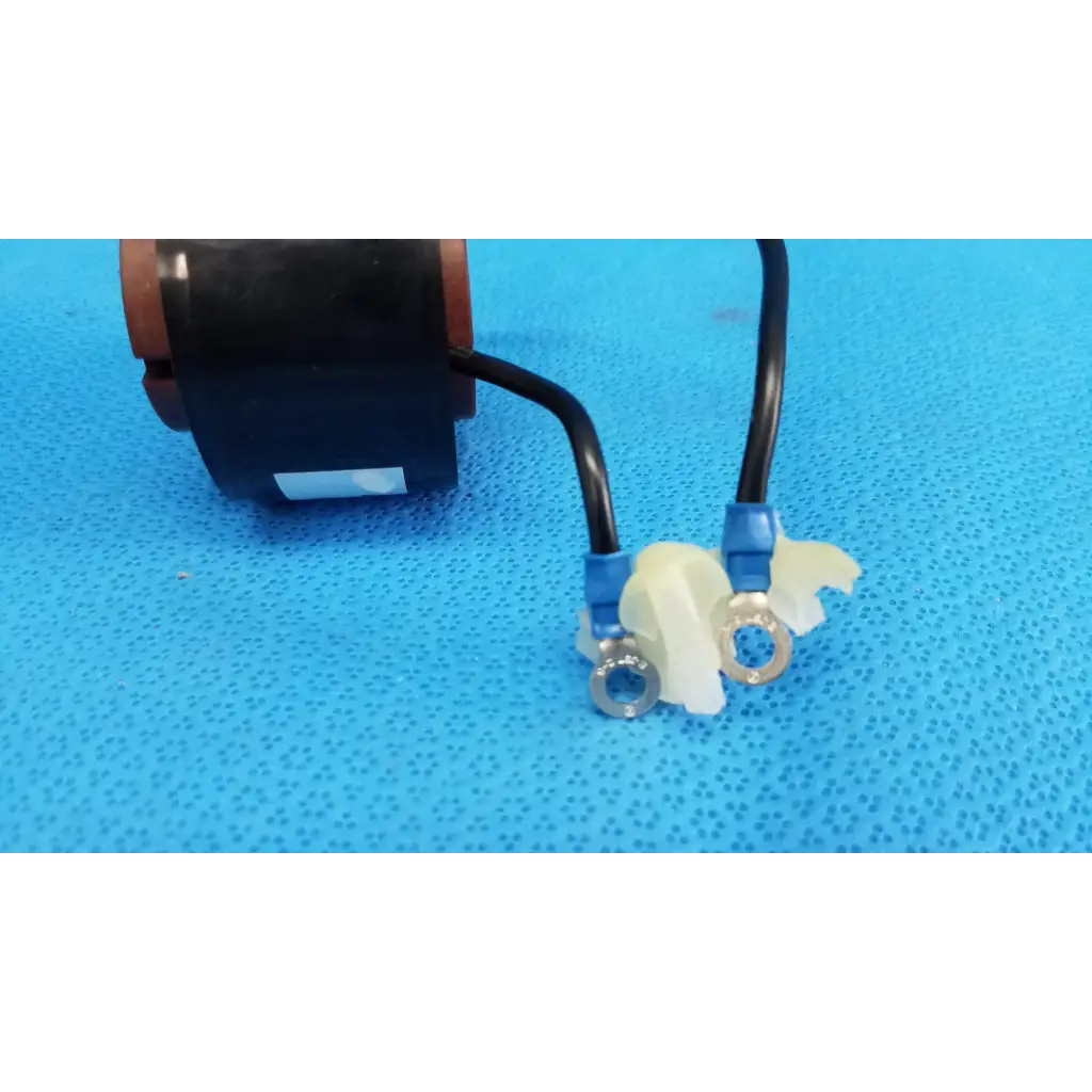 Black and copper solenoid actuator electromagnetic coil with two black wires and blue connectors for topcon retinal camera