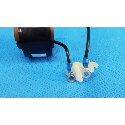 Black and copper solenoid actuator electromagnetic coil with two black wires and blue connectors for topcon retinal camera